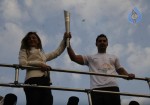 John Abraham,Maria Polyzou At Marathon Flame Run - 15 of 25