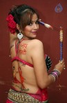 Tanisha Singh Hot Back Painting Photo Shoot - 7 of 31