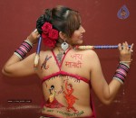 Tanisha Singh Hot Back Painting Photo Shoot - 9 of 31