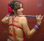 Tanisha Singh Hot Back Painting Photo Shoot - 11 of 31