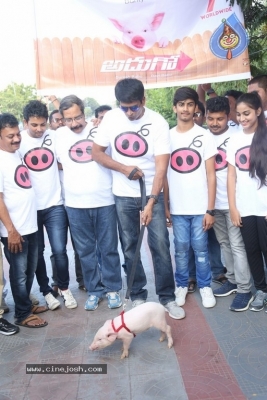 Adhugo Movie Team Padayatra With Piglet - 11 of 21