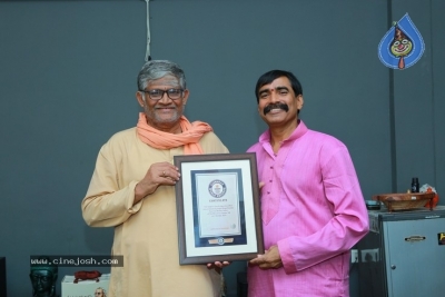 Chiranjeevi  Praises Guinness Record Winner Ramana Murthy - 11 of 21