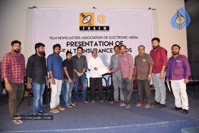 Film Newscasters Association of Electronic Media Health Card Distribution - 1 of 21