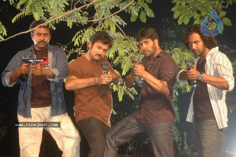Ayutha Poratam Movie Stills - 3 / 33 photos