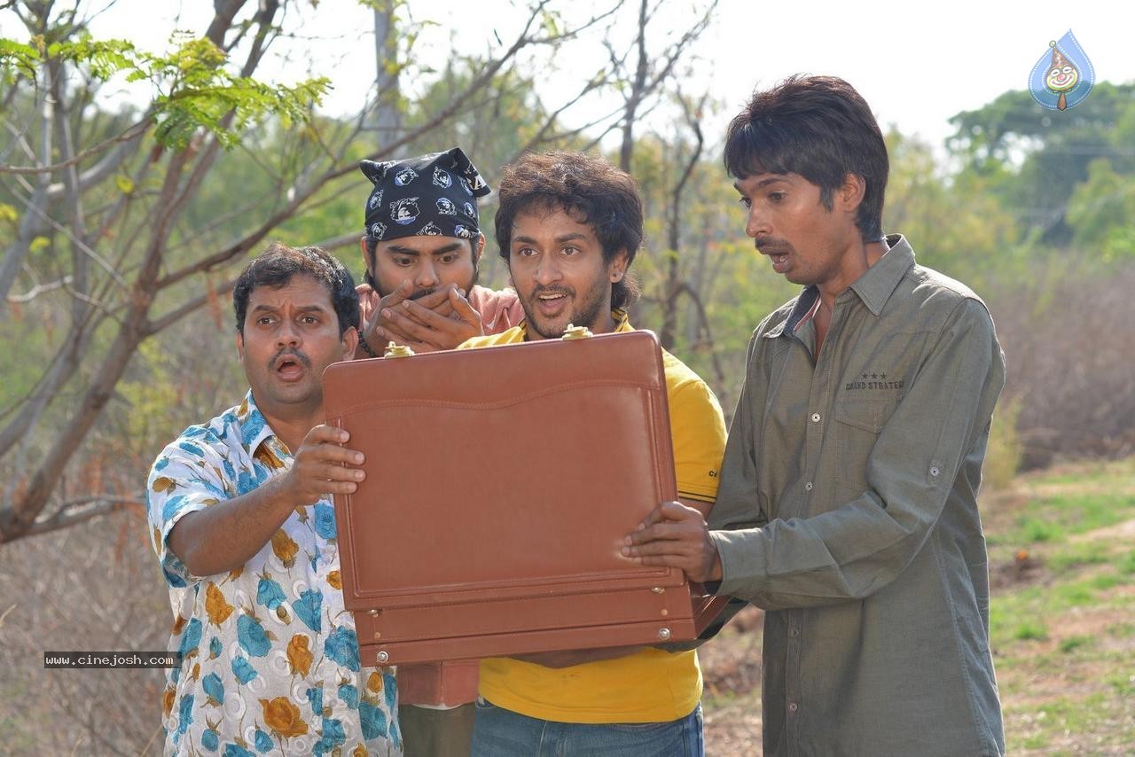 Dhanalakshmi Talupu Tadithey Movie Stills - 26 / 35 photos