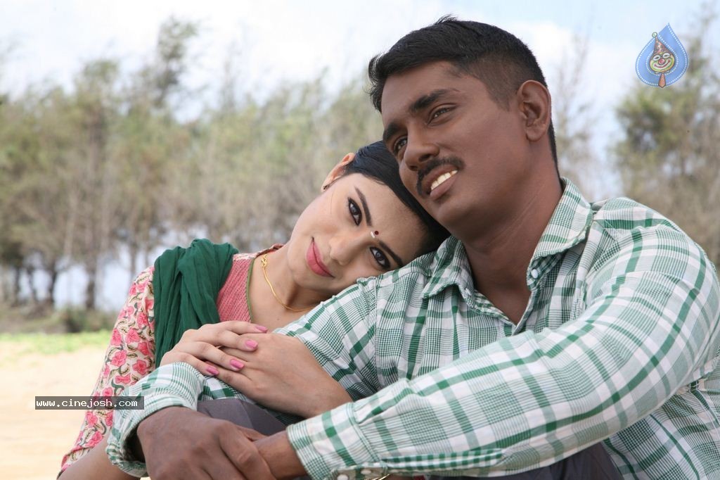Enakkul Oruvan Tamil Movie Stills - 16 / 30 photos