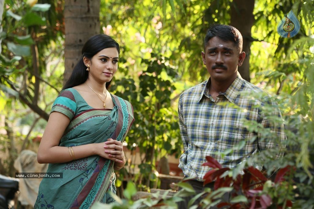 Enakkul Oruvan Tamil Movie Stills - 25 / 30 photos