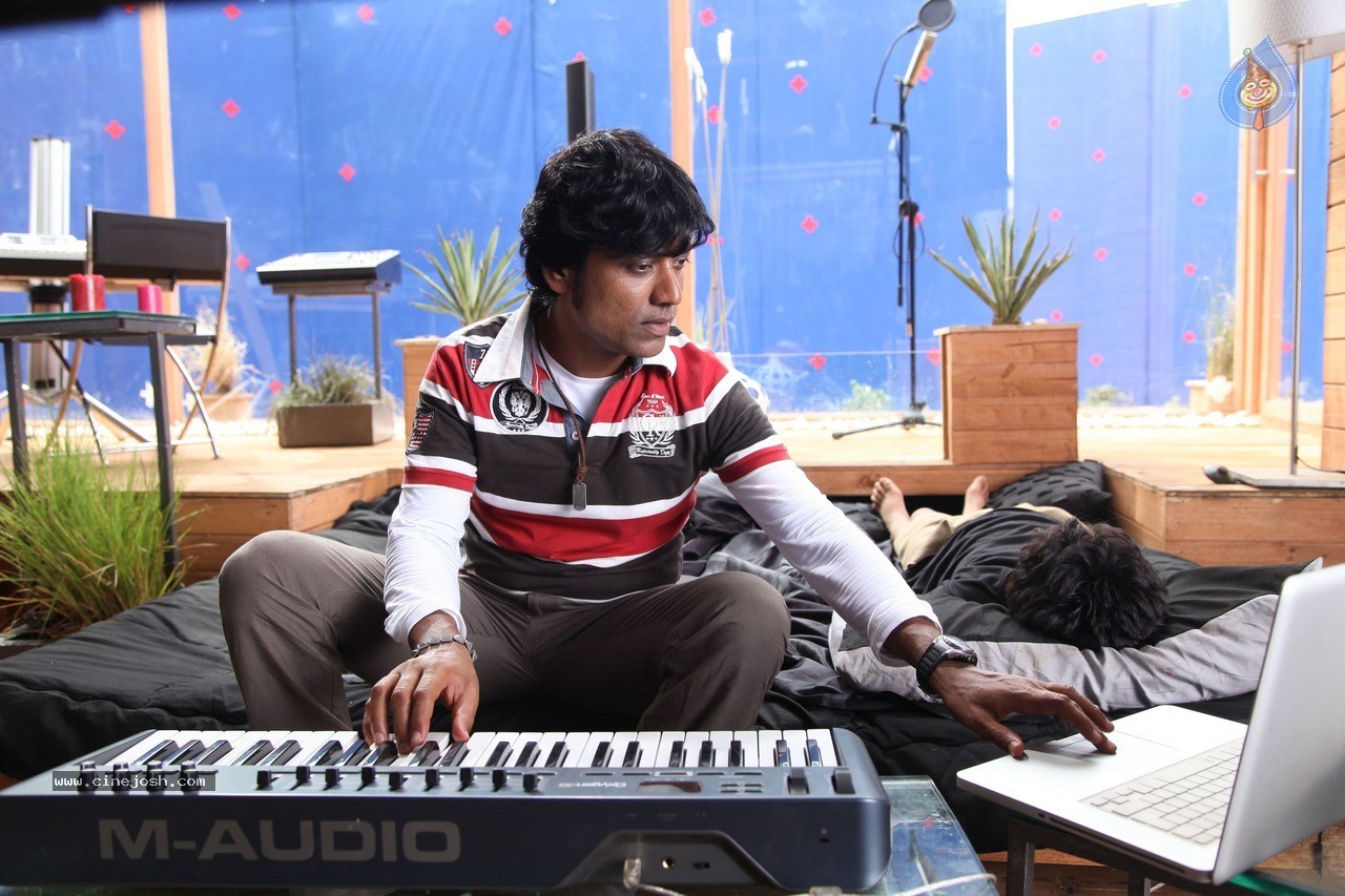 Isai Tamil Movie Stills - 10 / 23 photos