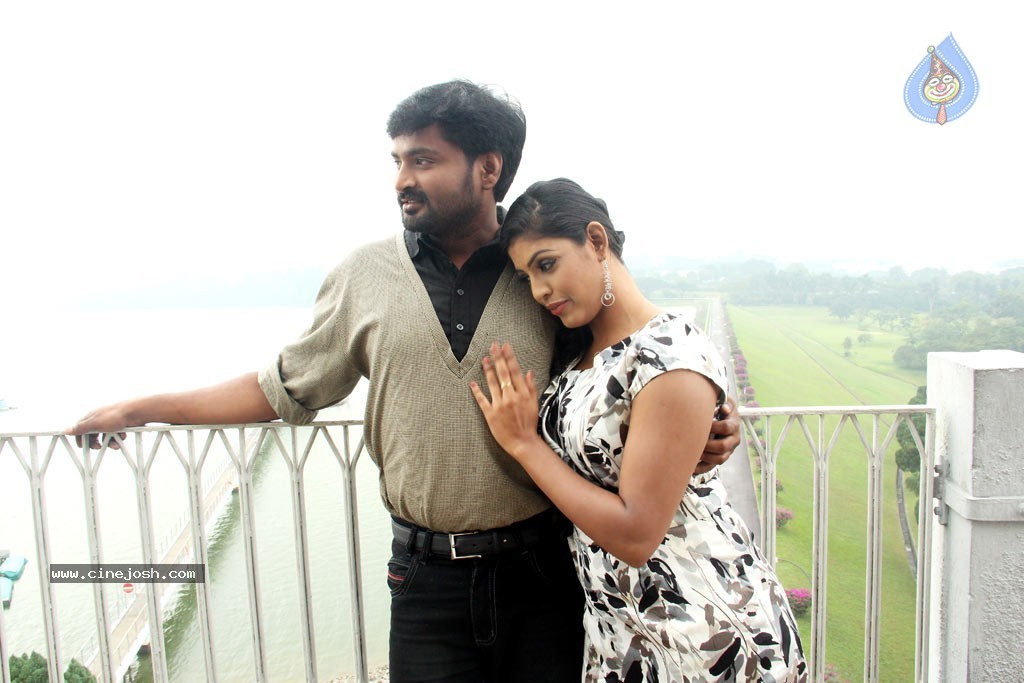 Kan Pesum Varthaigal Tamil Movie Stills - 25 / 43 photos
