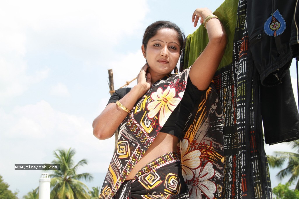 Madhuram Movie Hot Stills - 8 / 10 photos