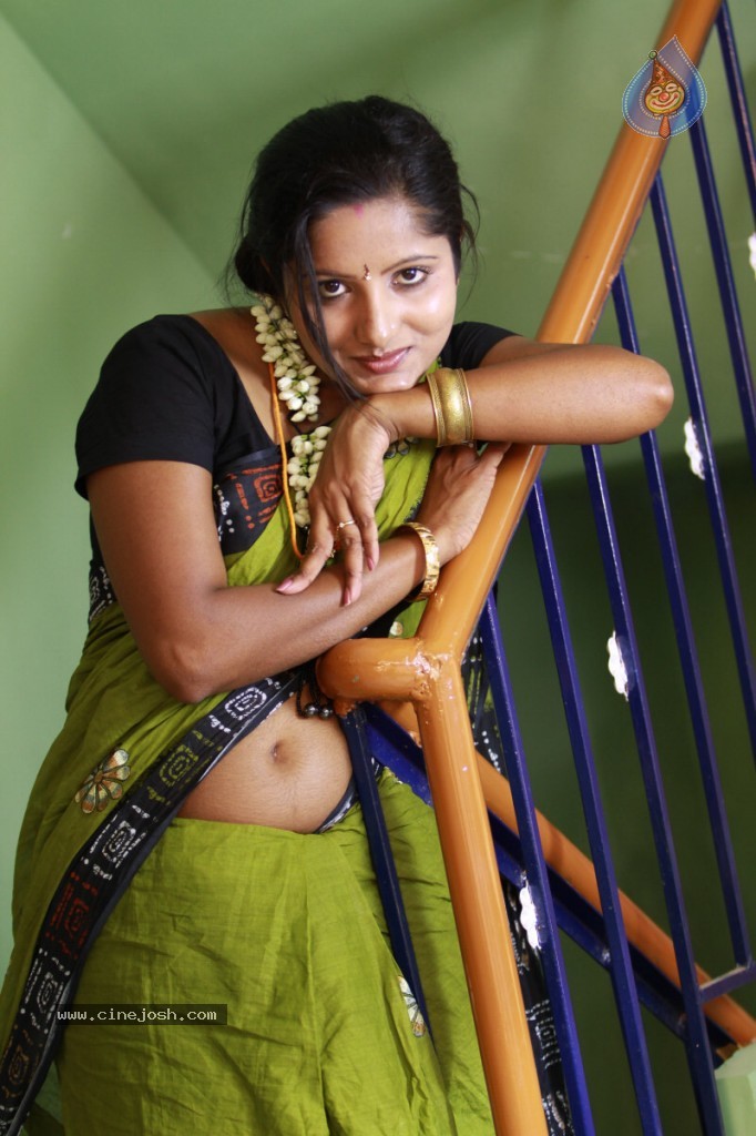 Madhuram Movie Hot Stills - 24 / 32 photos