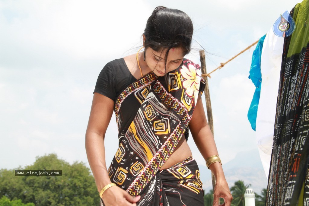 Madhuram Movie Hot Stills - 28 / 32 photos