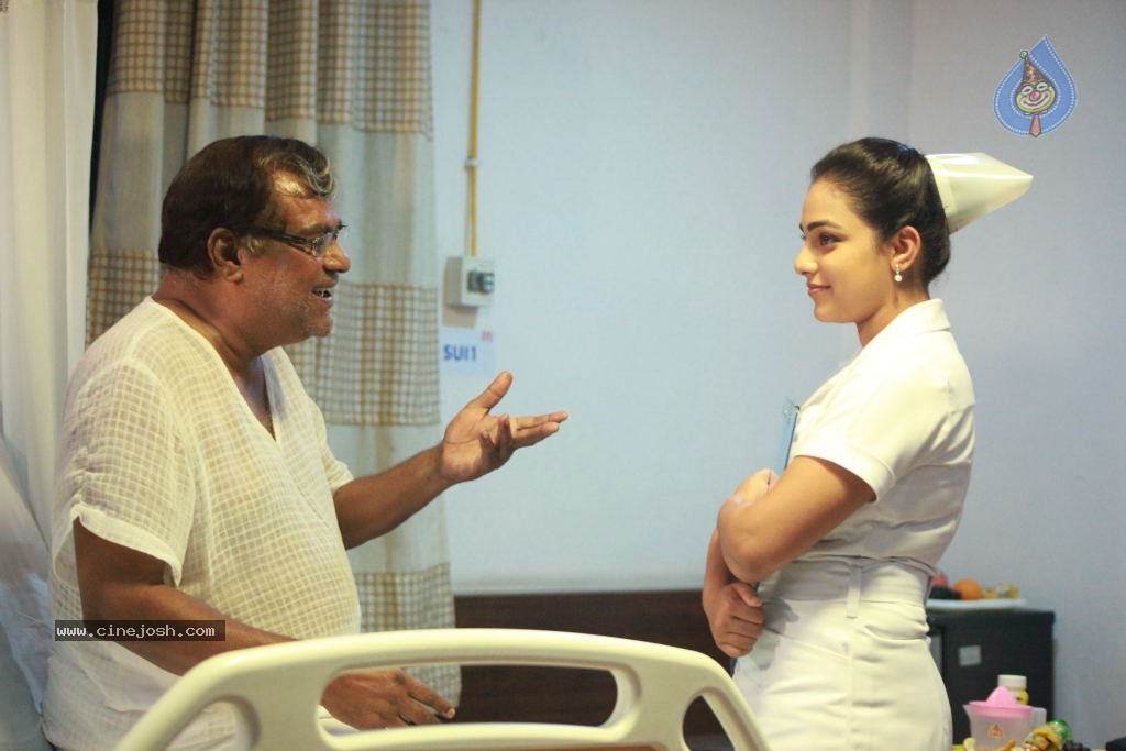 Malini 22 Movie Stills - 2 / 12 photos