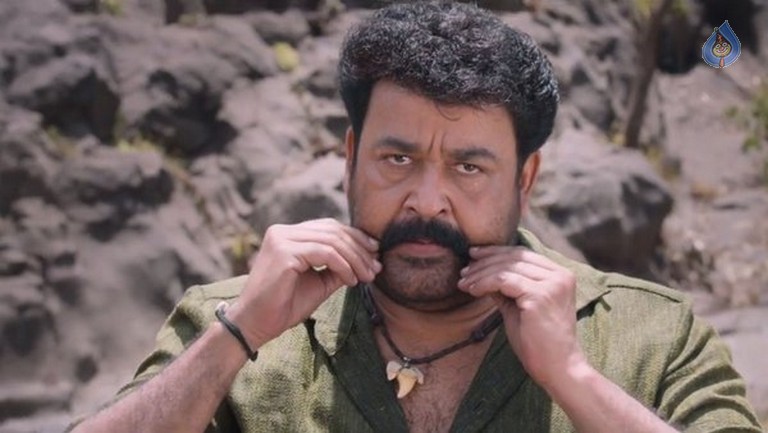 Manyampuli Movie Stills and Posters - 12 / 28 photos