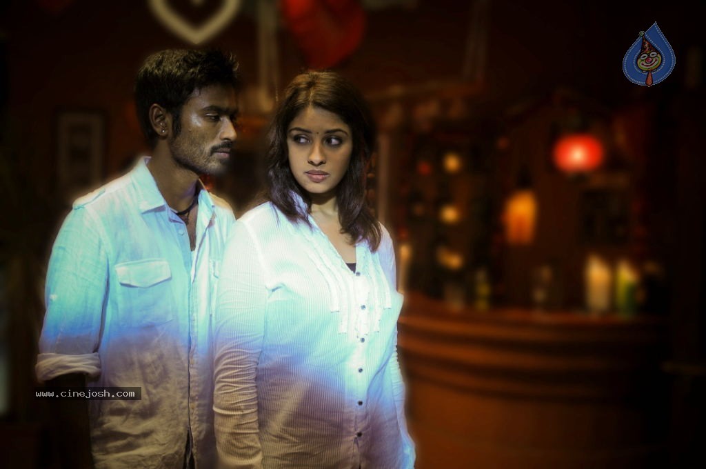 Maykkam Enna Movie Stills - 22 / 25 photos