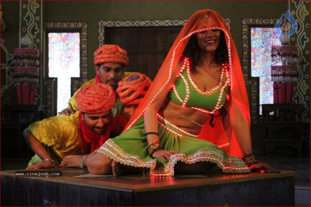 Mumaith Khan Item Song Stills in Aadivaram Amavasya Movie - 22 / 26 photos
