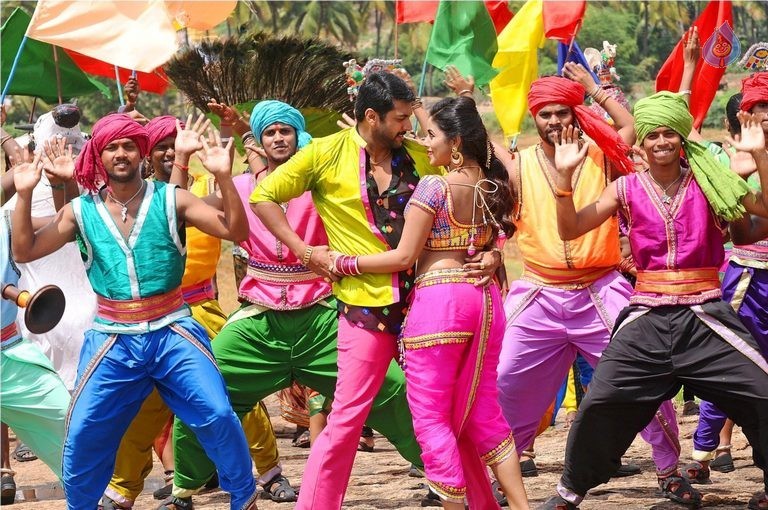 Sakalakala Vallavan Film Song Photos - 20 / 20 photos