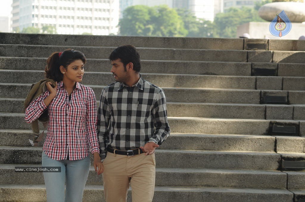 Sillunu Oru Santhippu Tamil Movie Stills - 18 / 55 photos