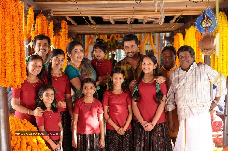 Thaanaa Serndha Koottam Movie Stills - 8 / 28 photos