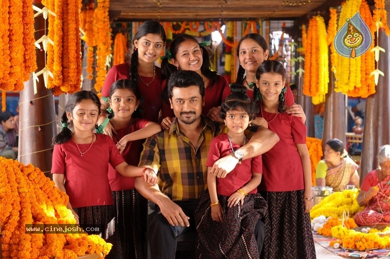 Thaanaa Serndha Koottam Movie Stills - 21 / 28 photos