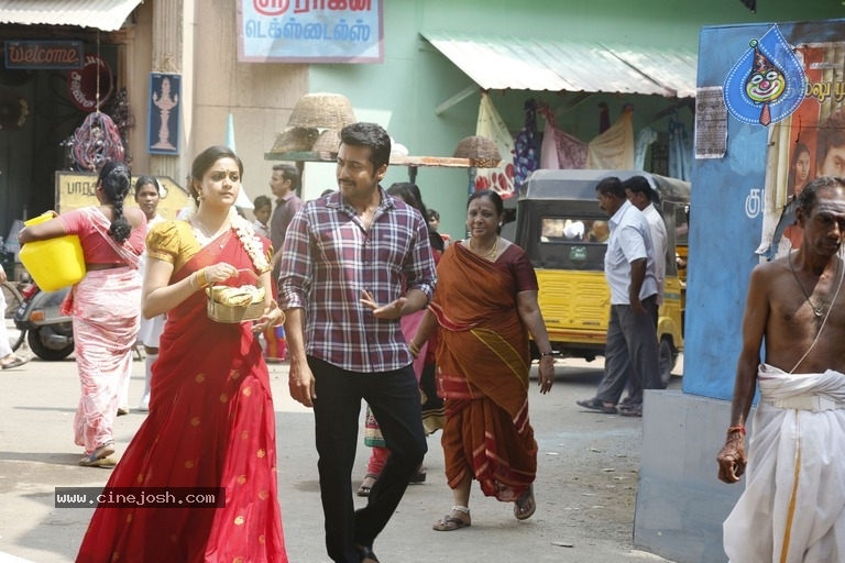 Thaanaa Serndha Koottam Movie Stills - 27 / 28 photos