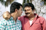 Maanthrikan Malayalam Movie Stills - 16 of 17