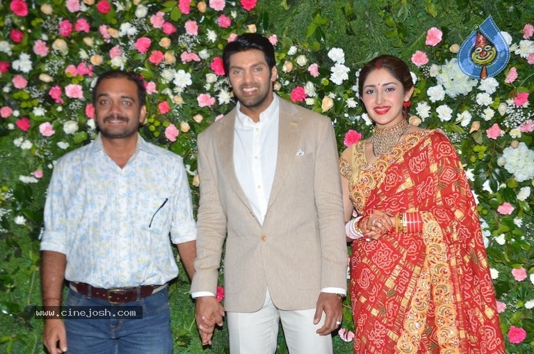 Arya and Sayesha Reception Photos - 14 / 21 photos