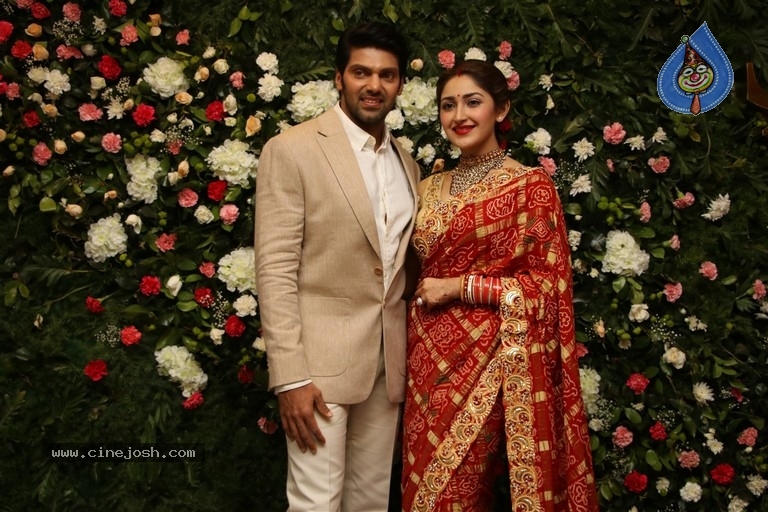 Arya and Sayesha Reception Photos - 17 / 21 photos