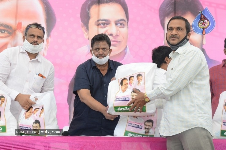 Celebs Distributes Grocery Kits - 2 / 39 photos