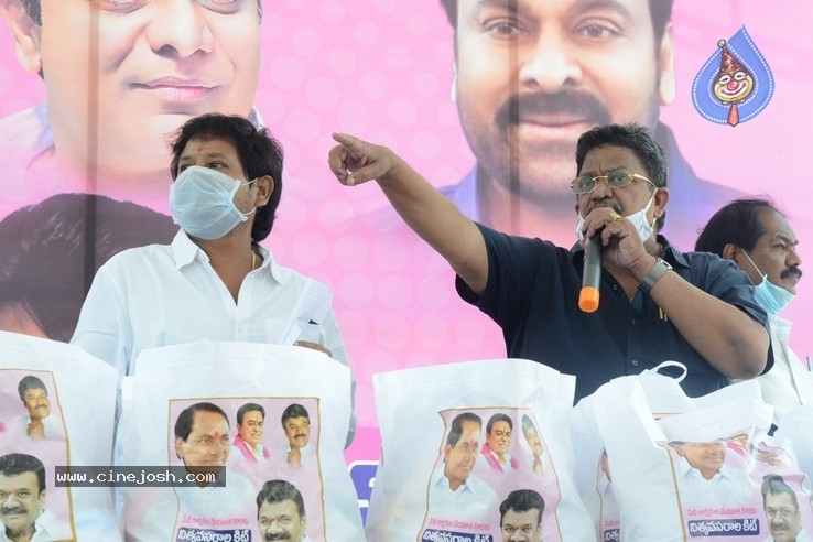 Celebs Distributes Grocery Kits - 22 / 39 photos