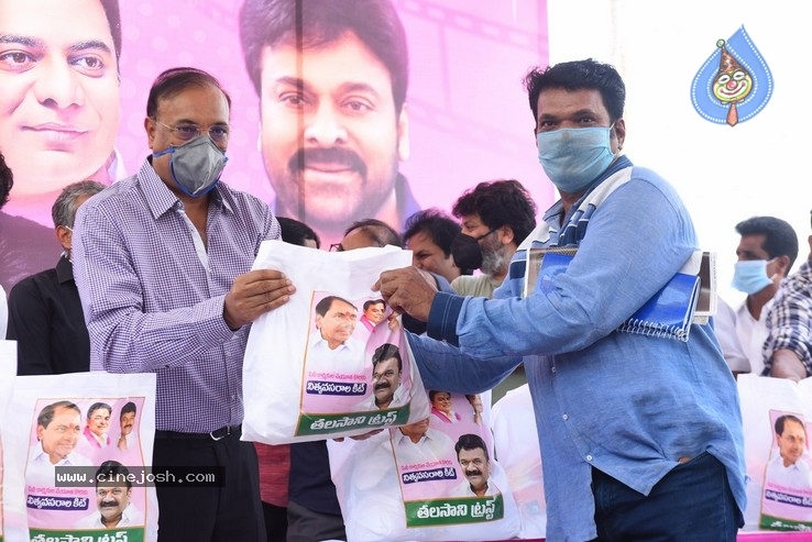 Celebs Distributes Grocery Kits - 28 / 39 photos