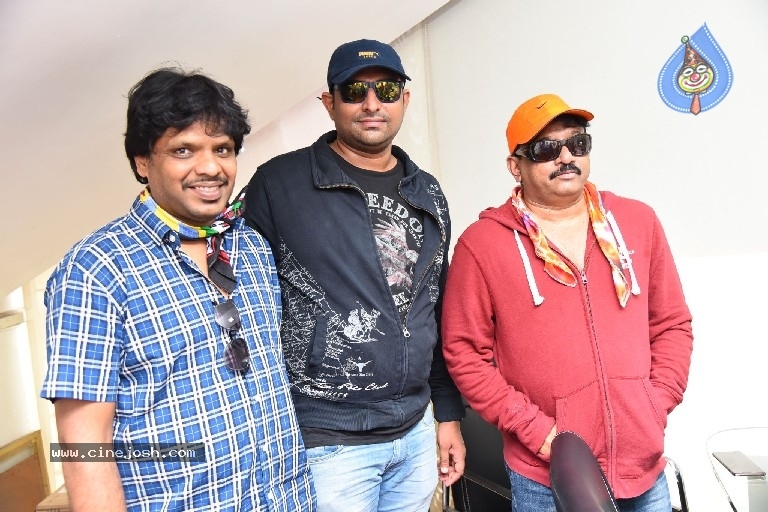 Ram Gopal Varma watch iSmart Shankar Movie - 1 / 21 photos