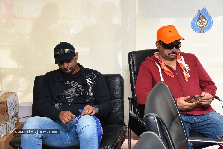 Ram Gopal Varma watch iSmart Shankar Movie - 4 / 21 photos