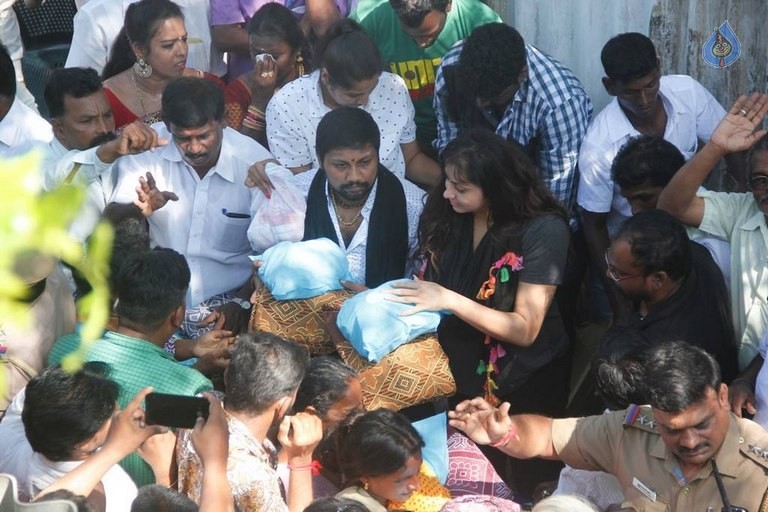 Namitha Flood Relief Help Photos - 18 / 20 photos