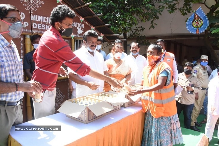 Sekhar Kammula Milk Distribution - 1 / 8 photos