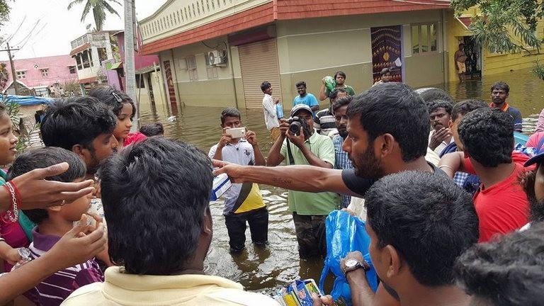 Vishal Supplying Food Packets and Water - 4 / 24 photos