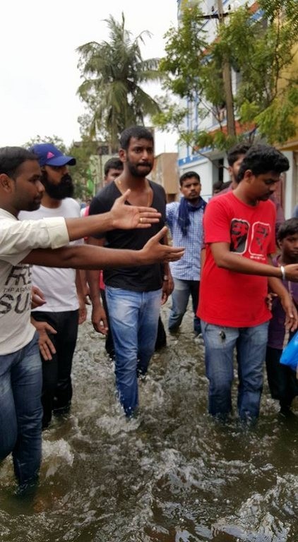 Vishal Supplying Food Packets and Water - 12 / 24 photos