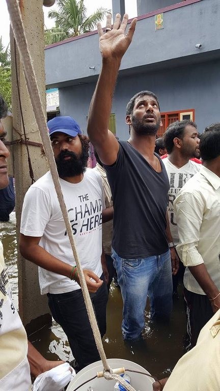 Vishal Supplying Food Packets and Water - 19 / 24 photos