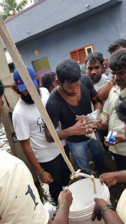 Vishal Supplying Food Packets and Water - 24 / 24 photos