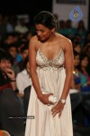 Hot cleavage show by sexy heroine.
