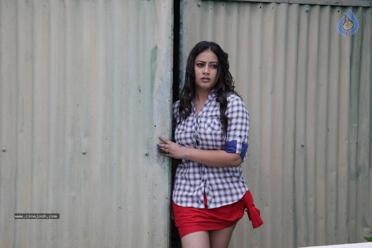 Nirayutham Tamil Movie Spicy Stills - 19 / 30 photos