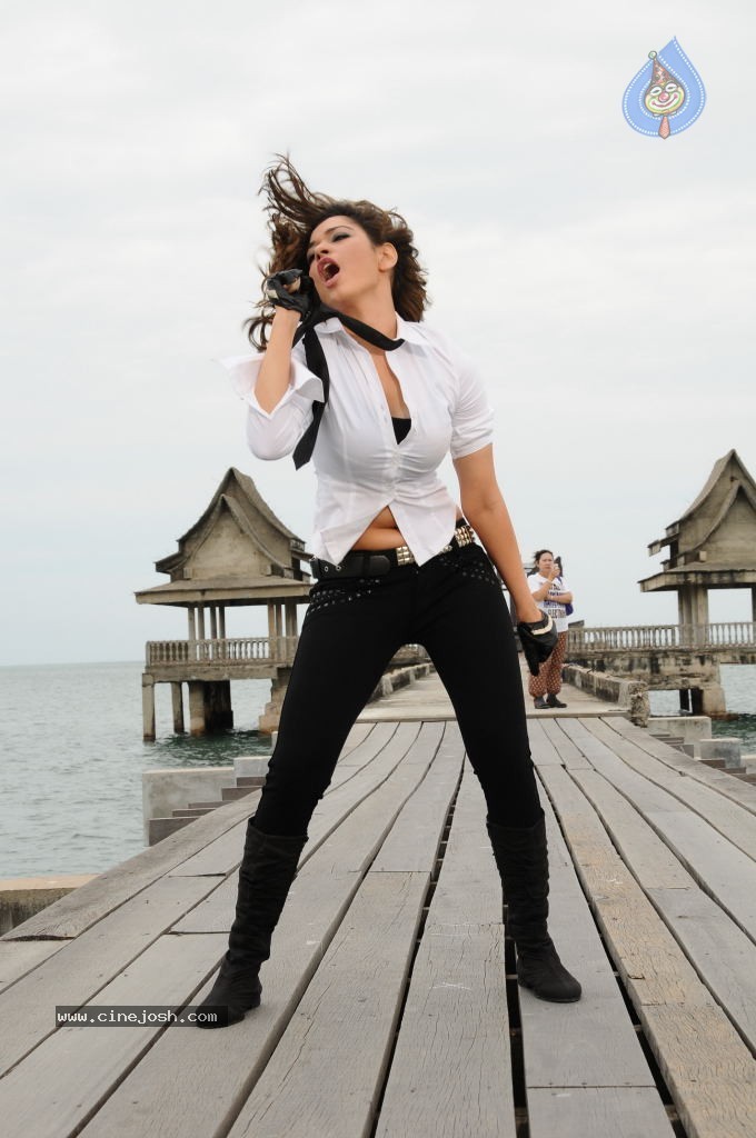 Tamanna Hot Stills in Rebel - 26 / 28 photos