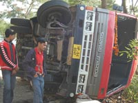10 students injured as college bus overturns