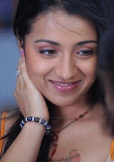 Trisha changes tattoo on her private place.