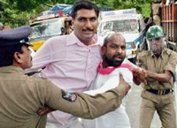 Harish Rao threatens by pouring petrol on his body.