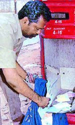 Telangana postman made naked in West Godavari?