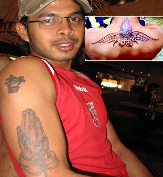 Sreesanth tatooed back depicts Cricket.