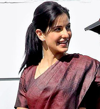 Katrina cleans toilet during charity