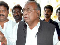 Suspend Acharya for APIIC Scam
