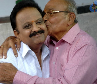 Legendary Director Kissing the Singer